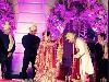 Arpita Khan and Aayush Sharma's wedding nuptials have begun at the Falaknuma Palace. The first pictures of the bride and groom have been tweeted from the venue. Arpita can be seen dressed in a heavily embroidered red lehenga and Aayush in white sherwani and sehra. The two can be seen exchanging garlands.