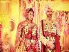 The most lovable bahu of Indian television Divyanka Tripathi got married with her co-star of popular show 'Ye Hai Mohabbatein' Vivek Dahiya on Friday. The couple got married in Divyanka's hometown Bhopal.Divyanka wore a beautiful red lehenga for her varmala and looked stunning as she walked towards her groom in the presence of her friends and family.Vivek wore a beige sherwani with a maroon stole and teamed up with a safa. He arrived in a yellow car, all excited. He was seen dancing with the baraatis.The duo was all stunning and happy in their wedding attire.Fans and well wishers were not behind as they poured their love and best wishes for the couple. The wedding was attended by Divyanka and Vivek's close pals.